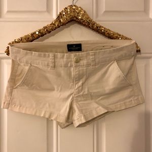 White AE stretch shorty size 6